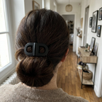 Klipix avis cliente — vue de dos, brune, chignon, pince noire